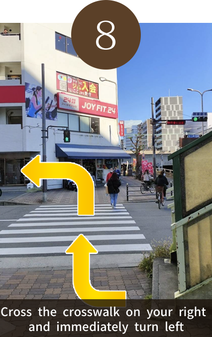 Cross the crosswalk on your right and immediately turn left